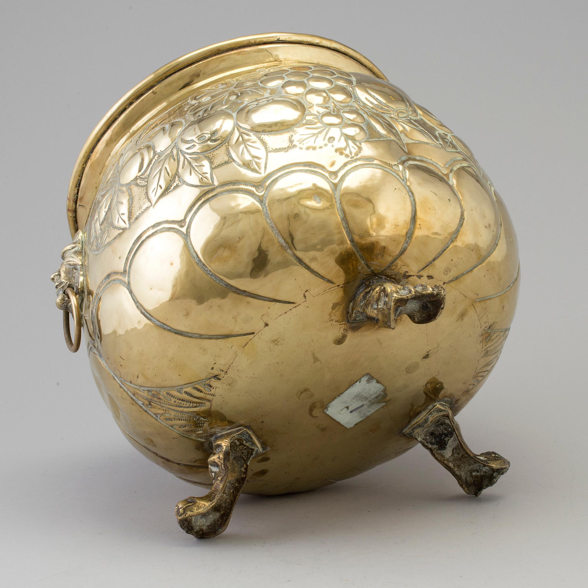 A 18th century brass flower pot.