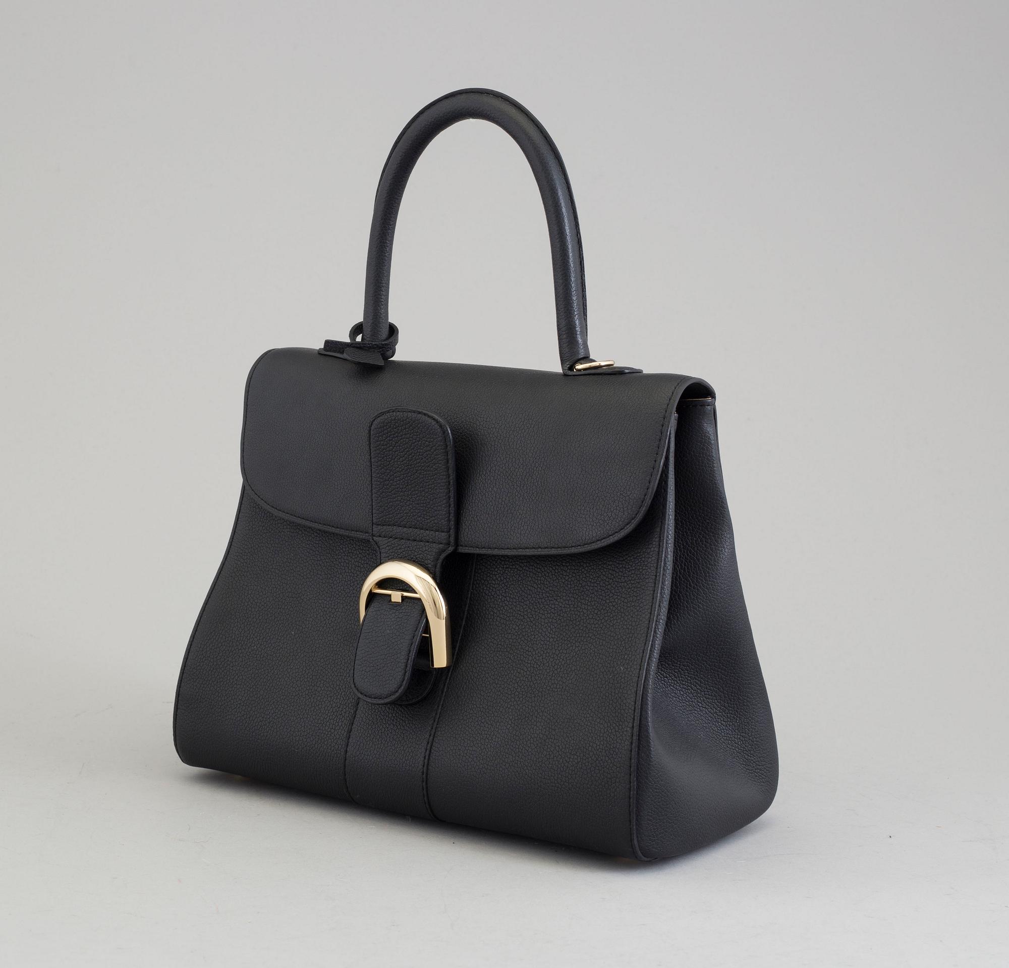 A Delvaux "Brillant" ladies handbag in black colored leather.