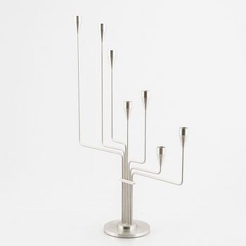 Piet Hein, a 'Karlsvognen' candle holder.