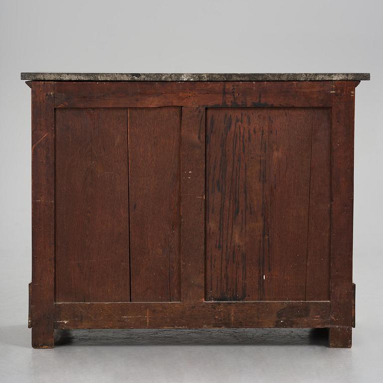 A French Empire mahogany commode, early 19th century.