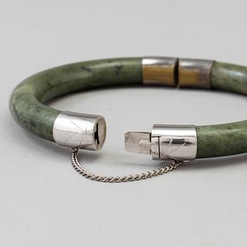 A Chinese armband and a pendant, 20th Century.