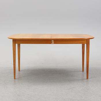 Josef Frank, a model '947' mahogany veneered dinner table for Firma Svenskt Tenn.