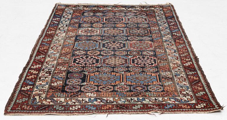 A Northwest Persian antique rug, c. 166 x 106 cm.