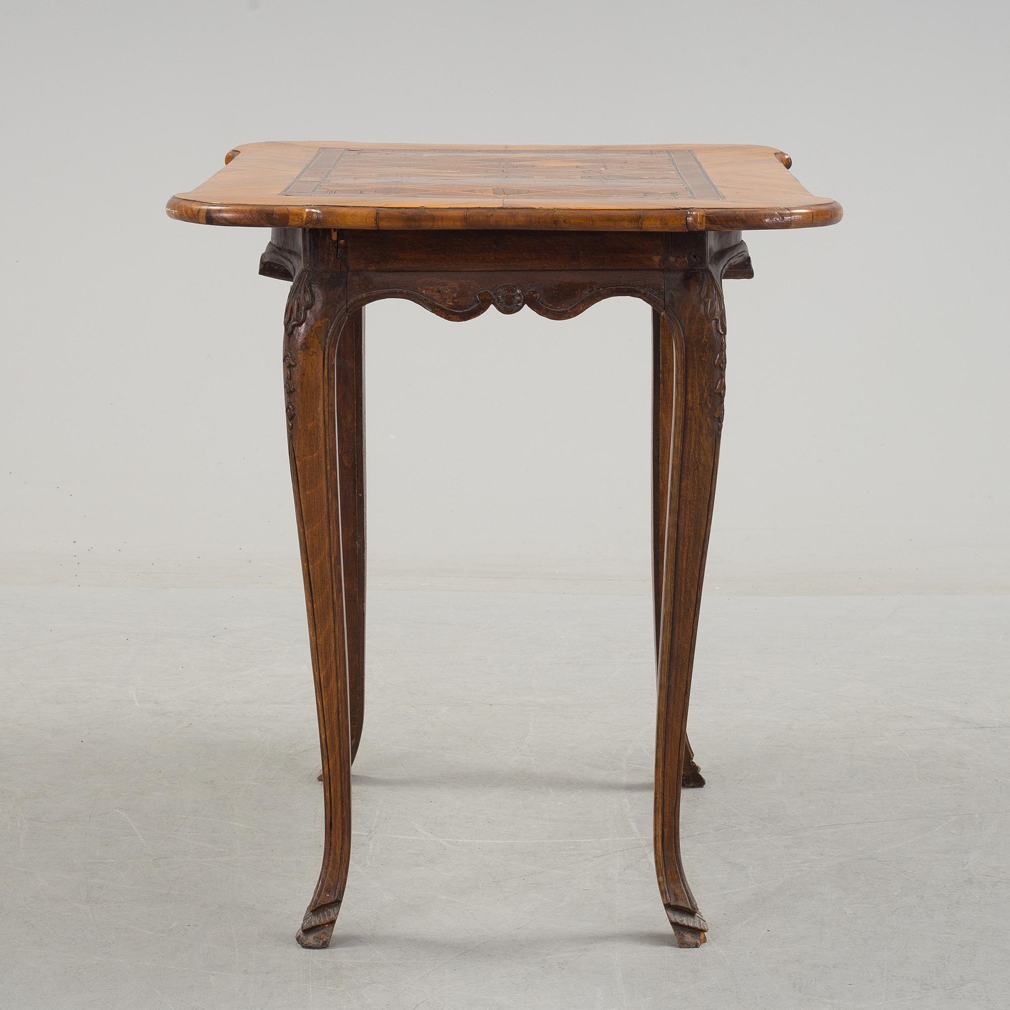 A mid 18th century rococo table.