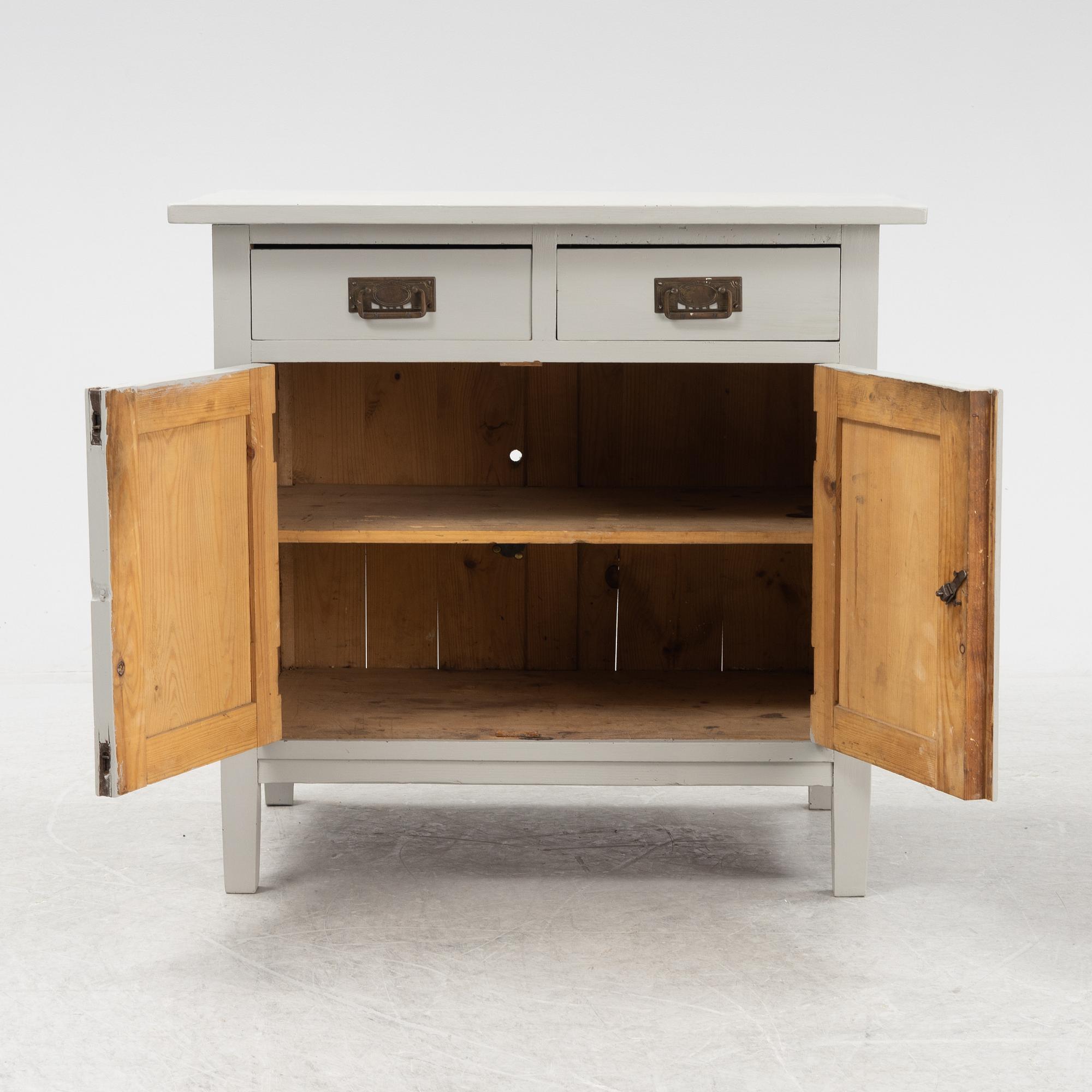 A painted sideboard, circa 1900.