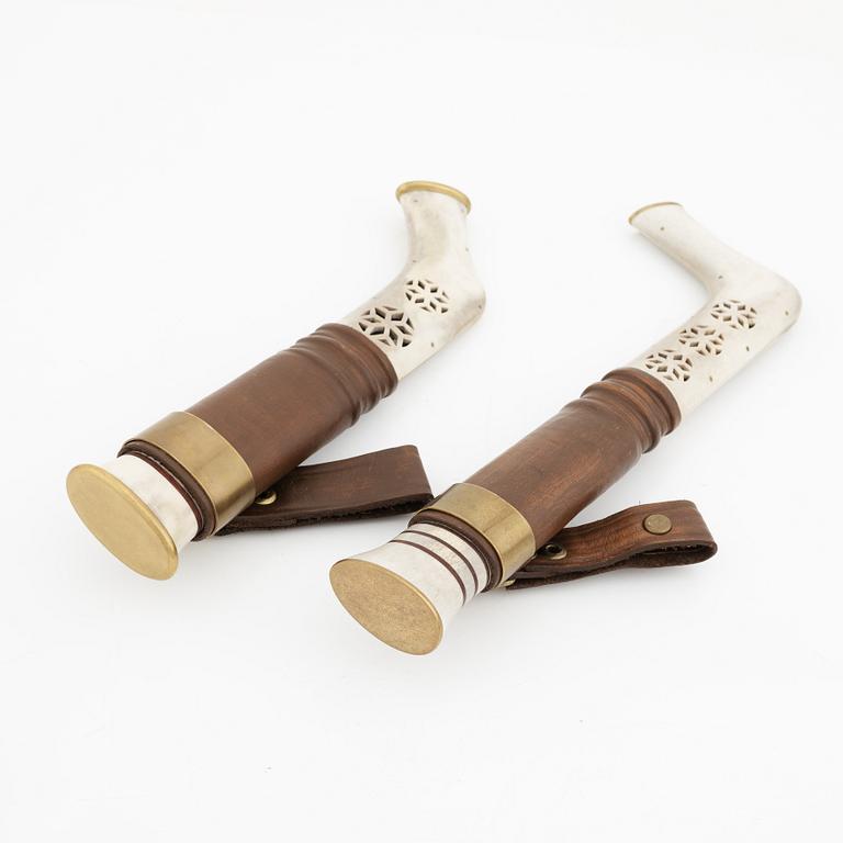 Two reindeer horn knives.