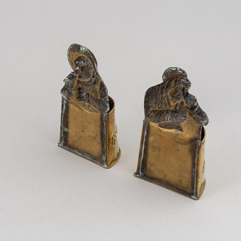 A pair of 19th century brass cutlery holders.