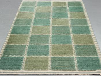 Barbro Nilsson, A carpet, "Gyllenrutan grön", knotted pile in relief ca 240,5-241,5 x 135,5-138 cm, signed AB MMF BN.