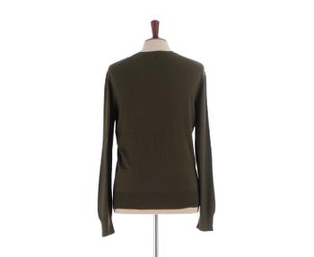 YVES SAINT LAURENT, a men's green wool sweater, size M.