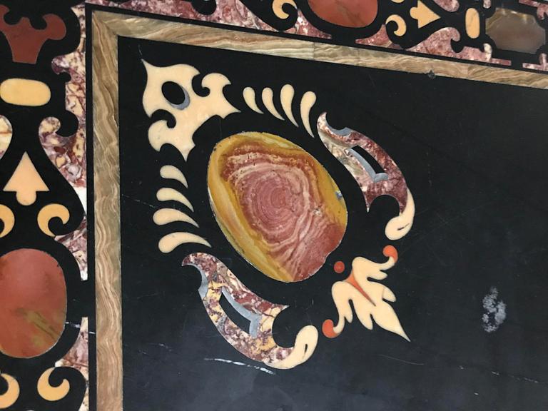 A pietre dure top, Italy, circa 1900, probably Rome or Naples. The stand in Louis XIV-style.