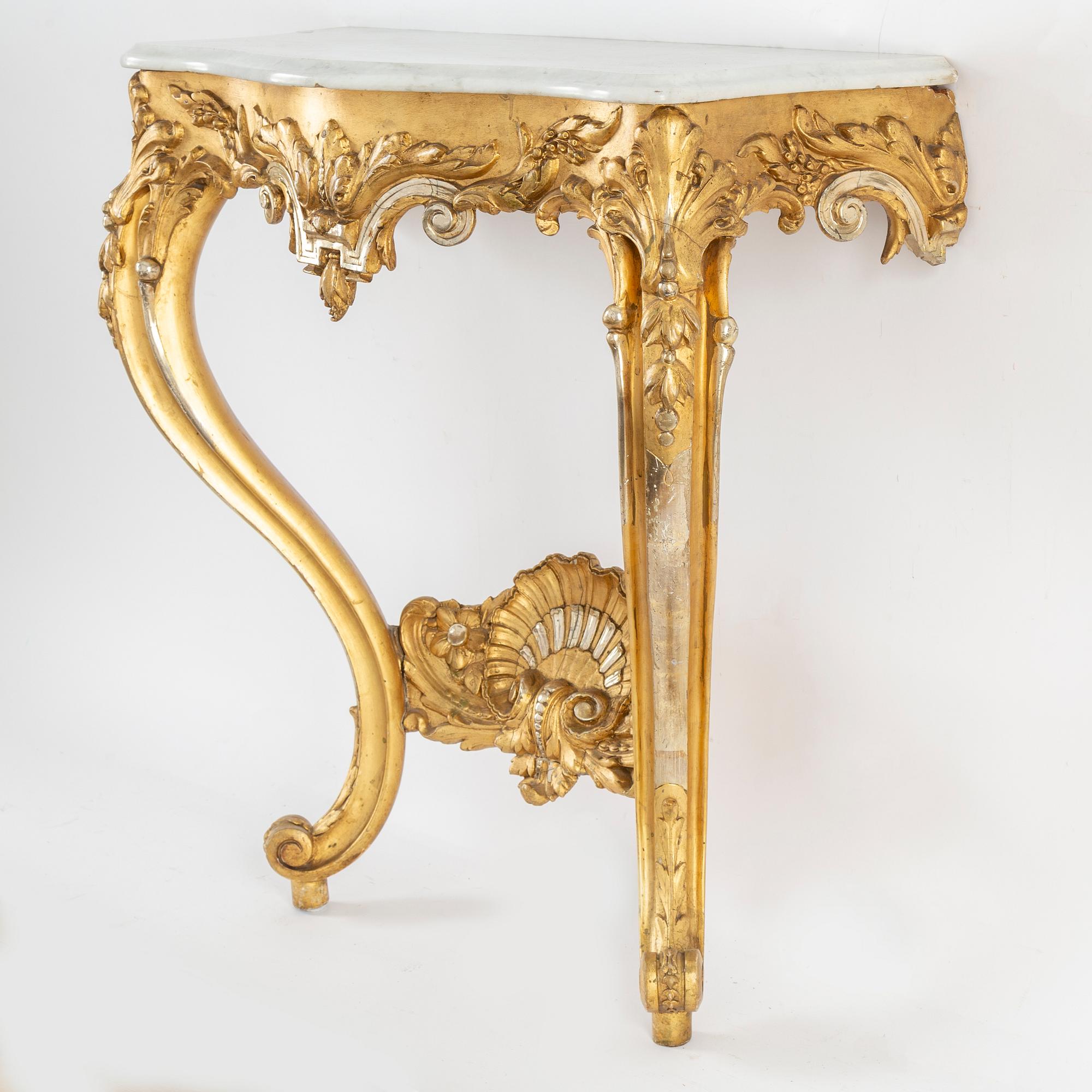 A late 19th century mirror and console table.