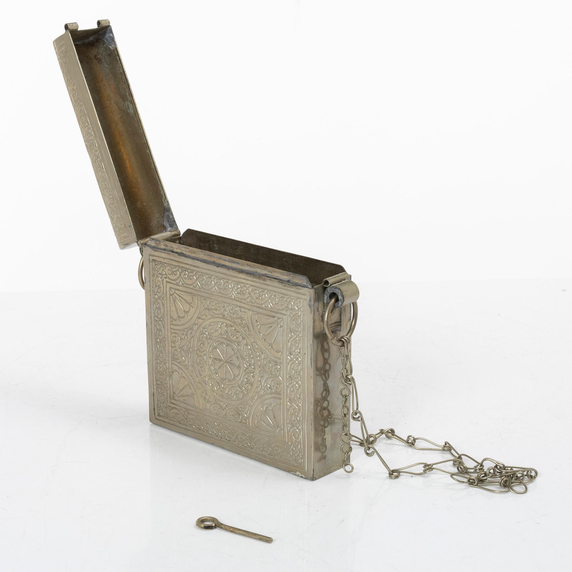 A silver plated Quran case, Noth Africa, circa 1900.
