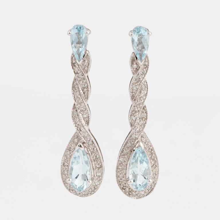 Pear faceted aquamarine and eight cut diamond earrings.