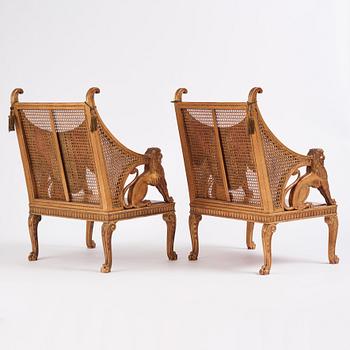 Helge Werner, a pair of gilt and carved Swedish Grace armchairs, ca 1920-30s.