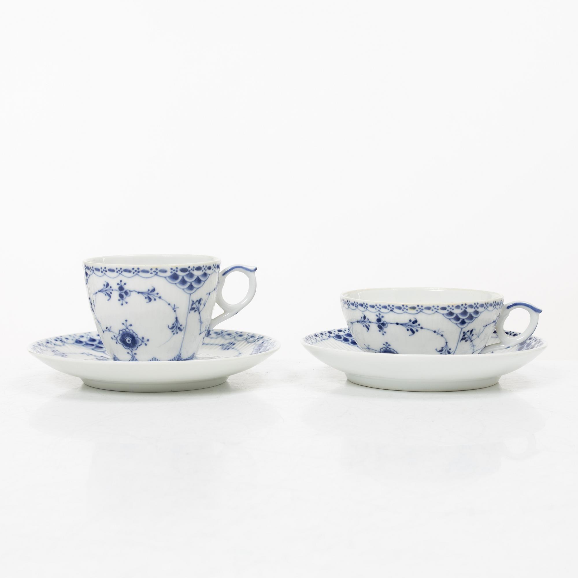 Royal Copenhagen, A 'Blue Fluted Half Lace" 30 pieces breakfast service, 'Musselmalet', partly 1889-1922 but also post 1923.