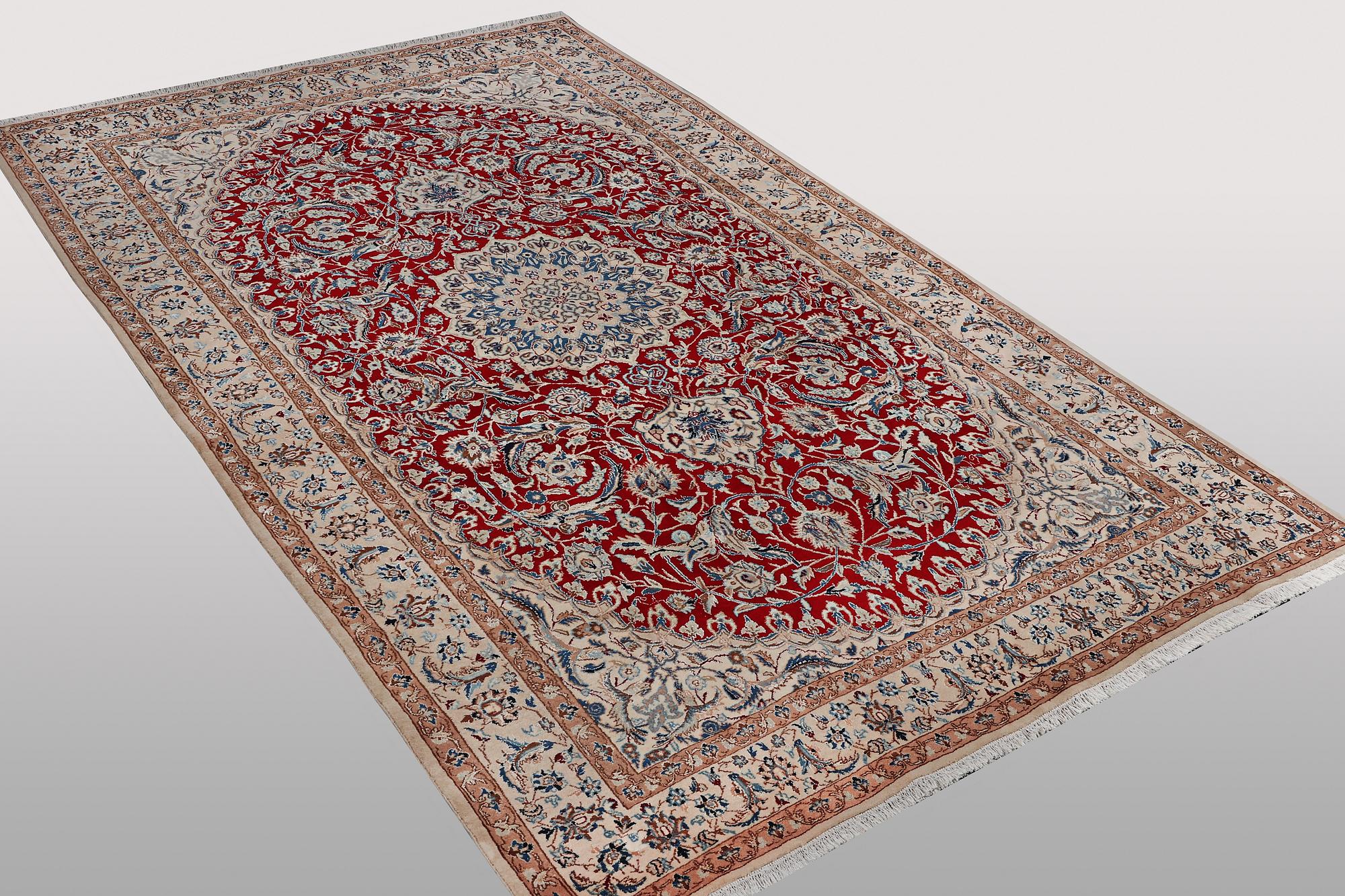 A carpet, Nain, part silk, 9 Laa, ca 295 x 178 cm.