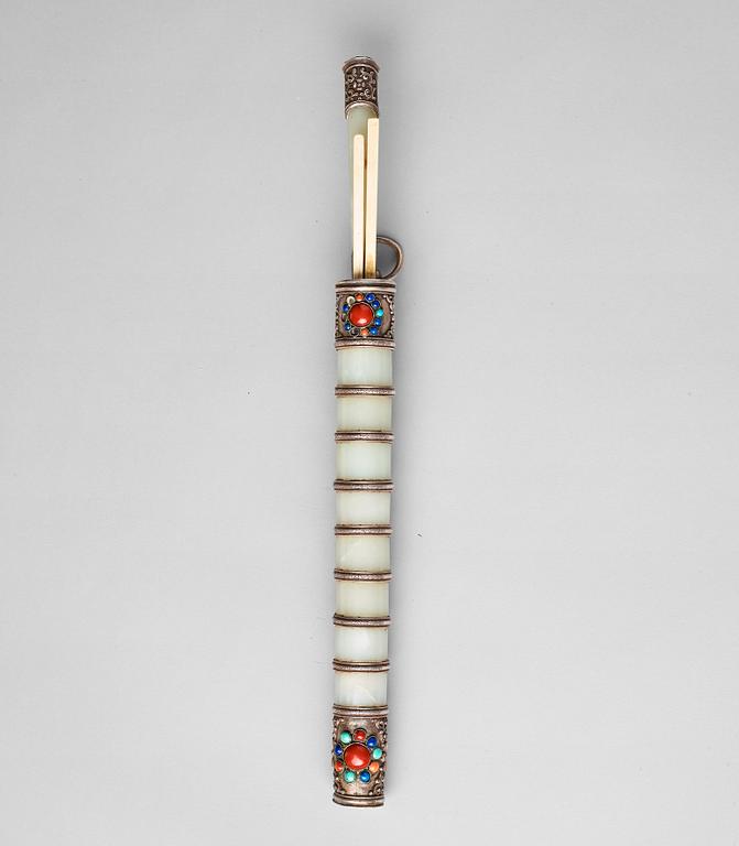 A Tibetan knife and chopsticks in a scabbard, 19th Century. With signature to the nephrite.