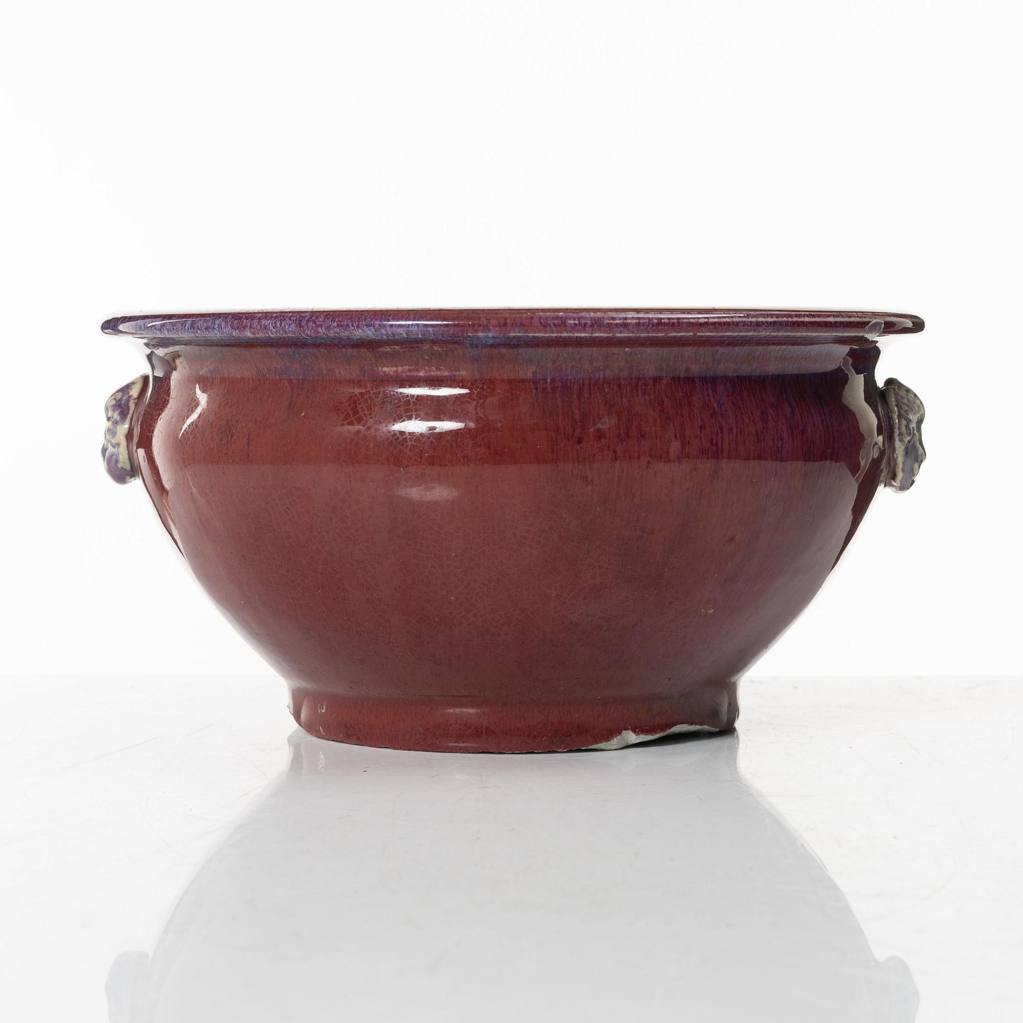 A Chinese sang de boeuf stoneware bowl / flowerpot, 20th century.