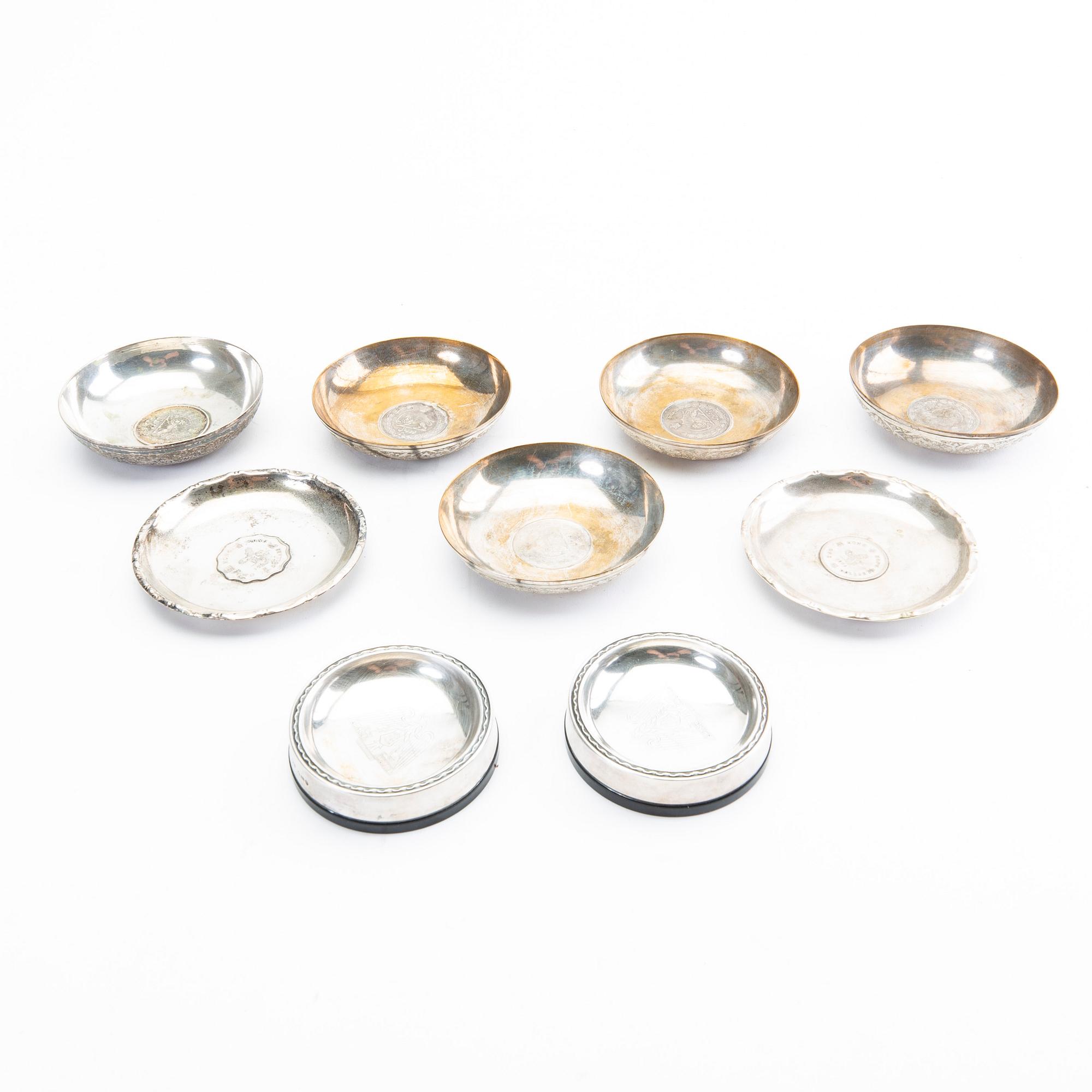 A 20th century set of 5+2+2 pcs of silver ashtrays.