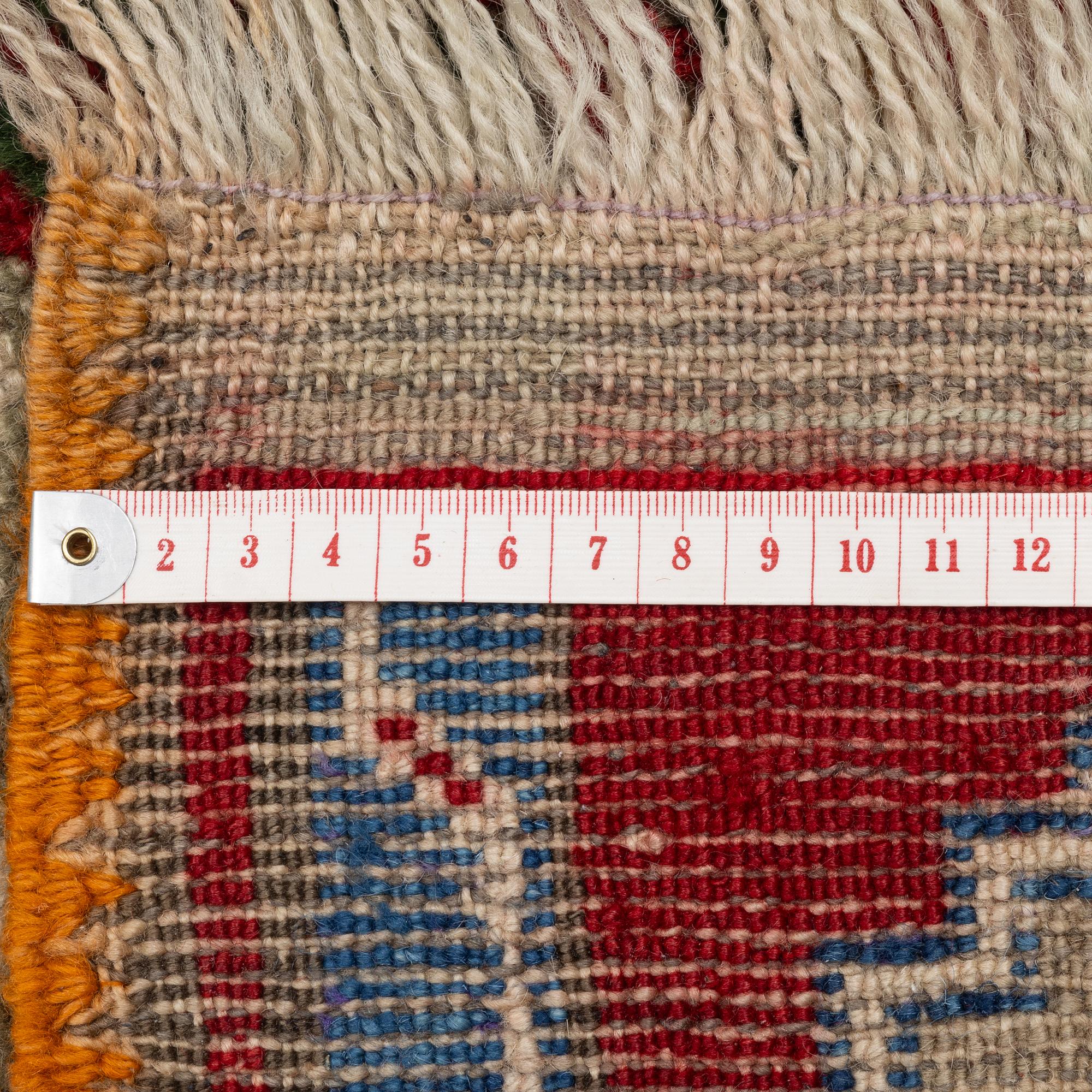 An antique Anatol rug, c. 170 x 134 cm.