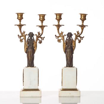 A pair of late Gustavian circa 1800 two-light candelabra.