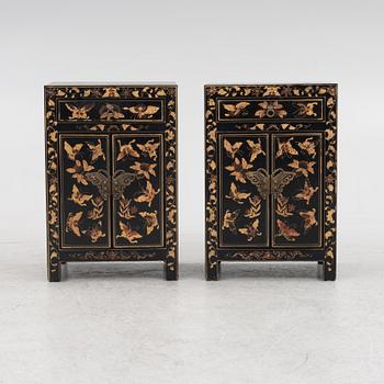 A pair of bedside tables/cabinets, China, 20th century.