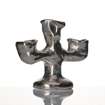Dan Wolgers, "Källa (Trearmad ljusstake)".