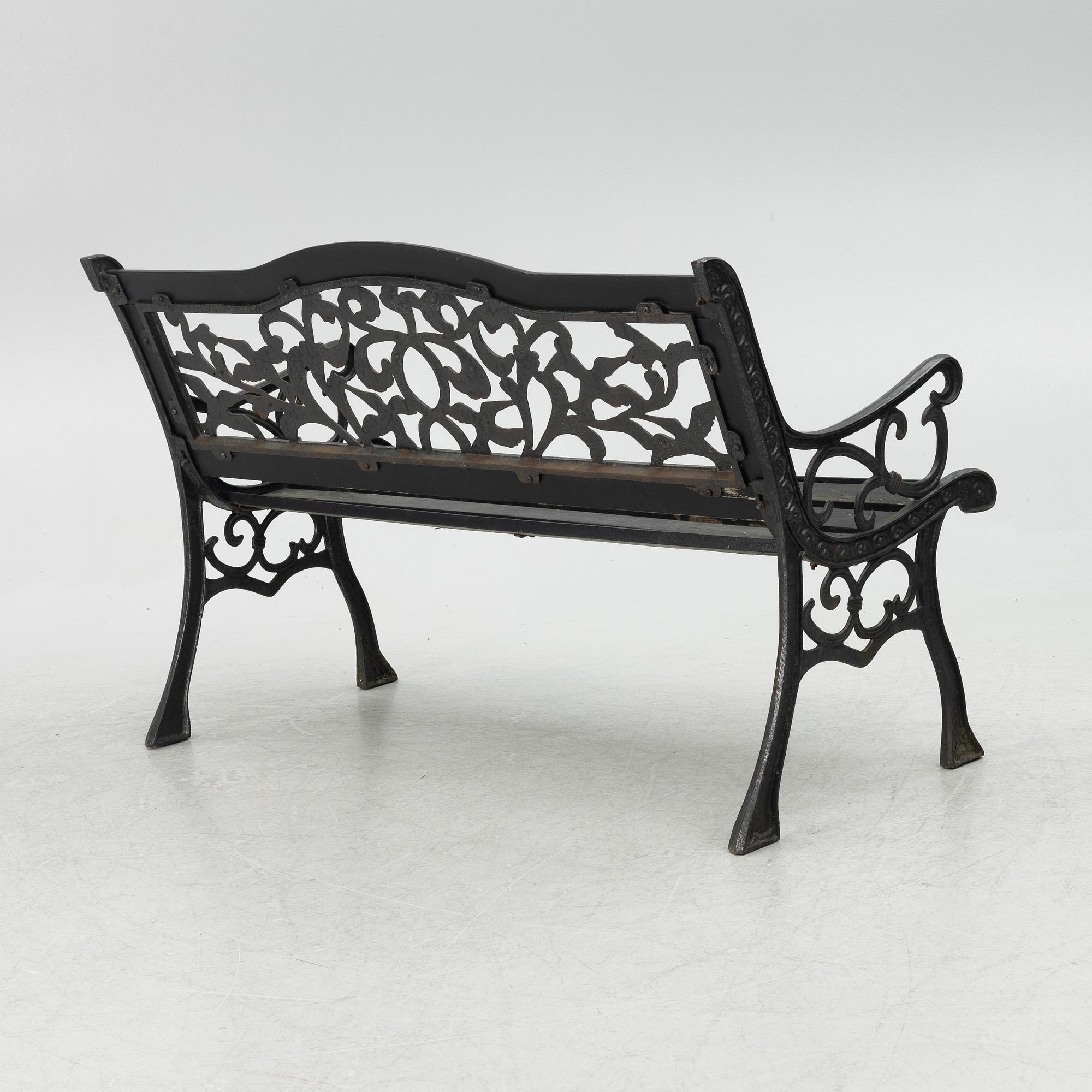 A garden bench, late 20th century.