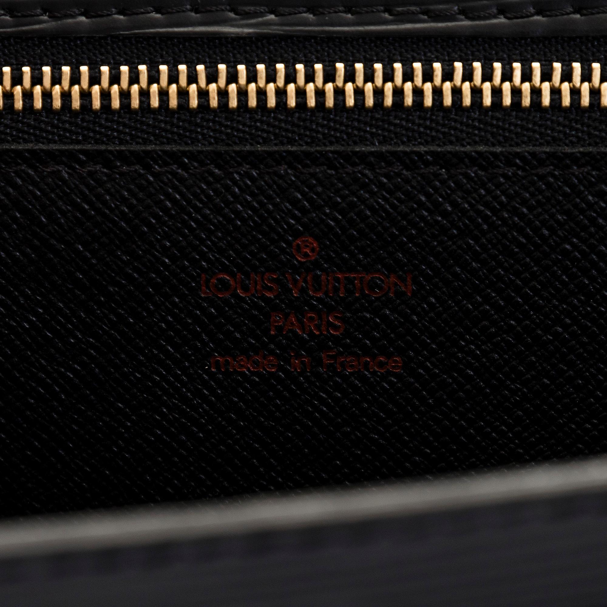 Louis Vuitton, laukku/clutch, ”Sellier Dragonne”.