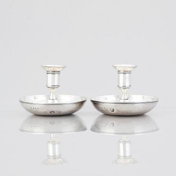 A pair of Swedish early 19th century silver chamber-candlesticks, mark of Adolf Zethelius, Stockholm 1816.