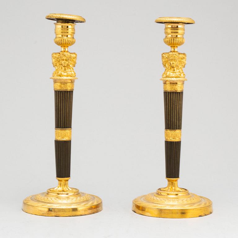 A pair of French Empire candlesticks, early 19th century.