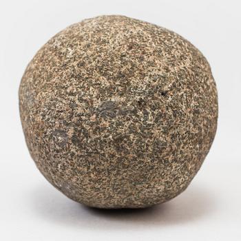 A set of five iron and stone balls.
