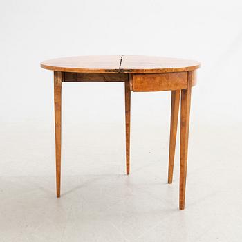 Half-moon table, 19th century.