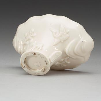 A blanc de chine libation cup, Qing dynasty.