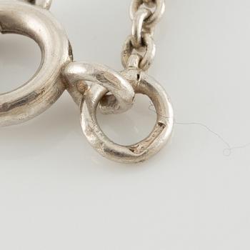Elis Kauppi, hänge, silver med blå sten, med kedja.