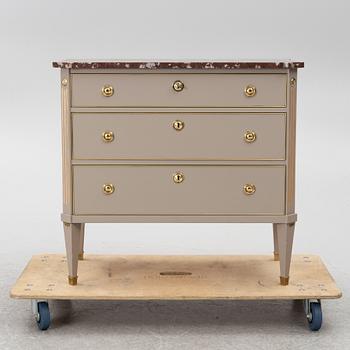 A Gustavian style chest of drawers, Mid 20th Century.