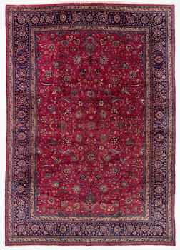 A semi-antique Mashad carpet of Shah Abbas design, c 516 x 360 cm.