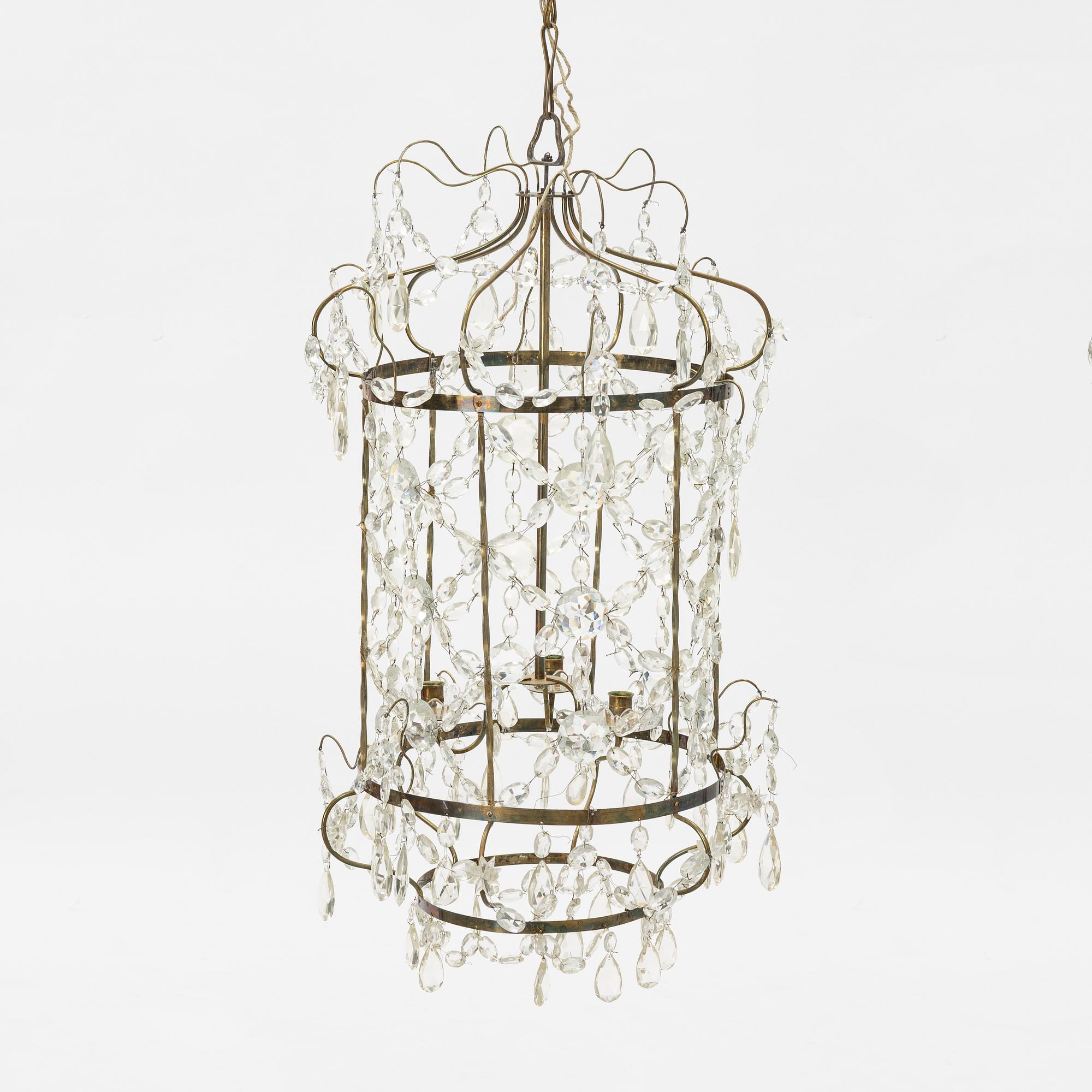 A three-light Gustavian-style hanging light, circa 1900.