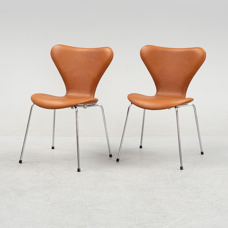 Arne Jacobsen, six leather 'Series 7' chairs, Fritz Hansen, Denmark.