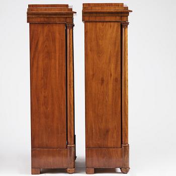 A pair of Swedish Empire mahogany bibliothèques, Stockholm, early 18th century.