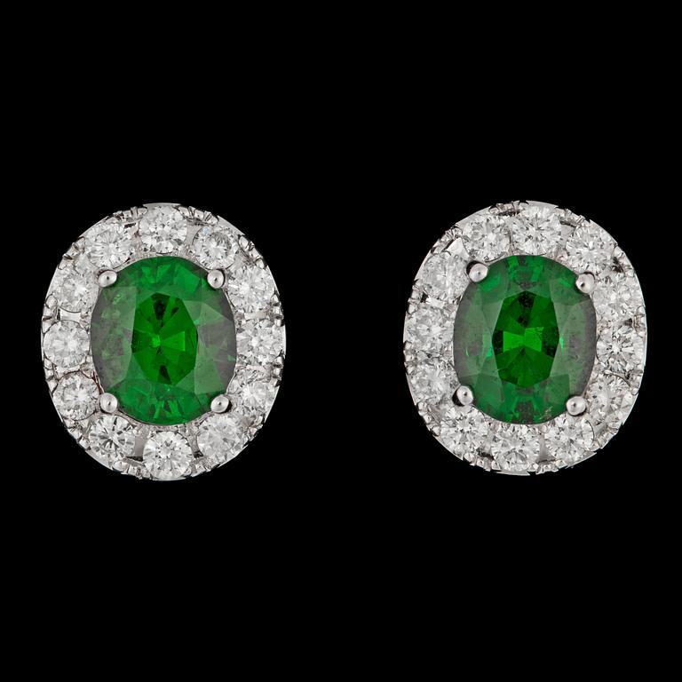 A pair of tsavorite, tot. 2.16 cts and brilliant cut diamond earrings, tot. 0.70 cts.