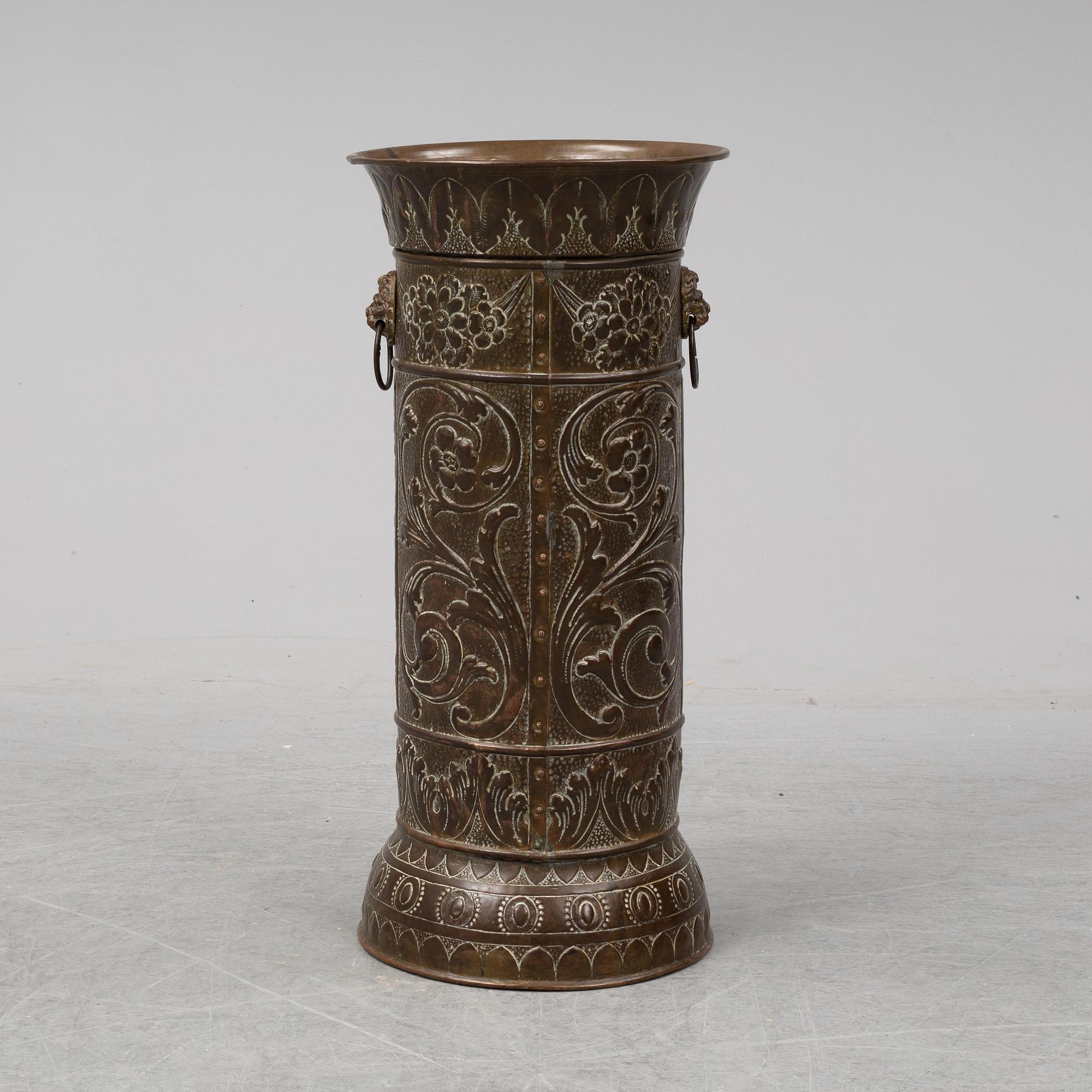 A 19th century brass umbrella stand.