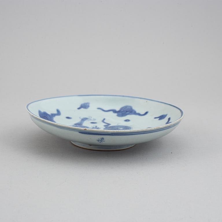 A blue and white serving dish and a japanese dish, Qing dynasty, 18th and 19th century.