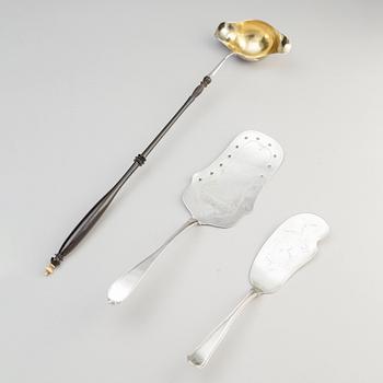 Two Silver Serving Spoons, including a Rococo-Revival spoon with mark PR Hinnerup, Denmark 1851.