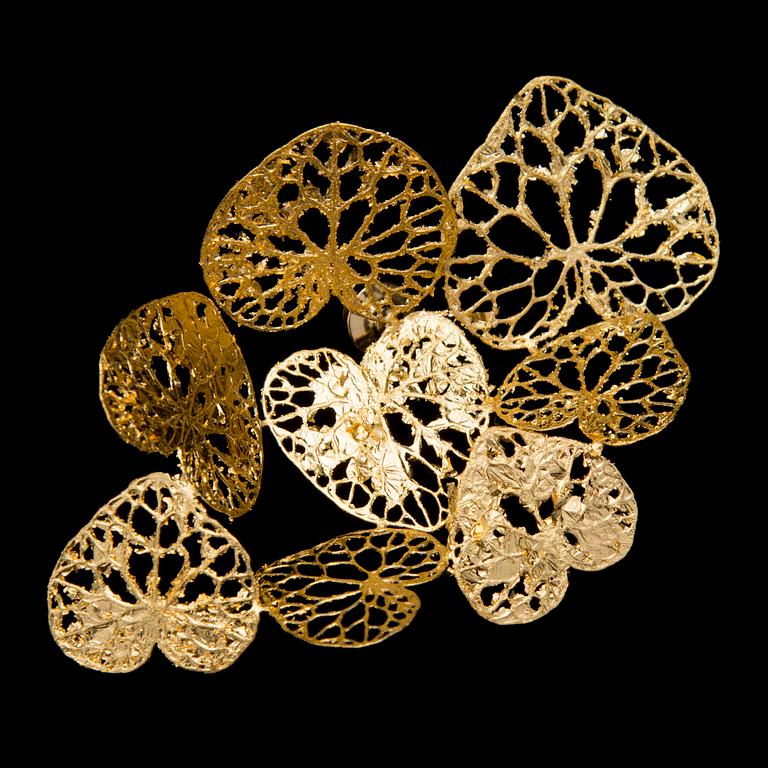 A MARIA JAUHIAINEN BROOCH, "cloud of Hearts", steel, 24K gold leaf, 2018.