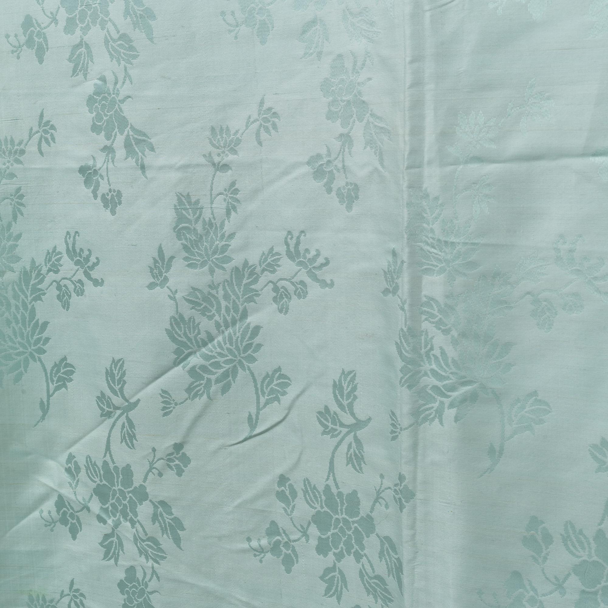 A pale celadon green silk, late Qing dynasty, circa 1900.