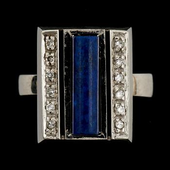 RING, 18k vitguld med lapis lazuli och åttkantslipade diamanter tot ca0,12ct. Vikt 9g.