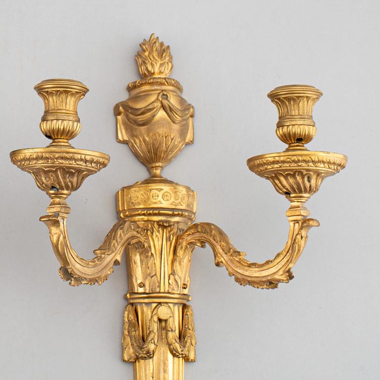 A pair of Louis XVI style 19th century appliquer.