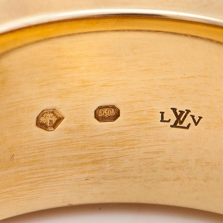 Louis Vuitton, an 18K gold 'Empreinte' ring with diamonds.