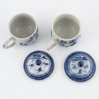 A blue and white terrine with cover and stand, Qianlong (1736-95) and two blue and white custard cups, 19th century.